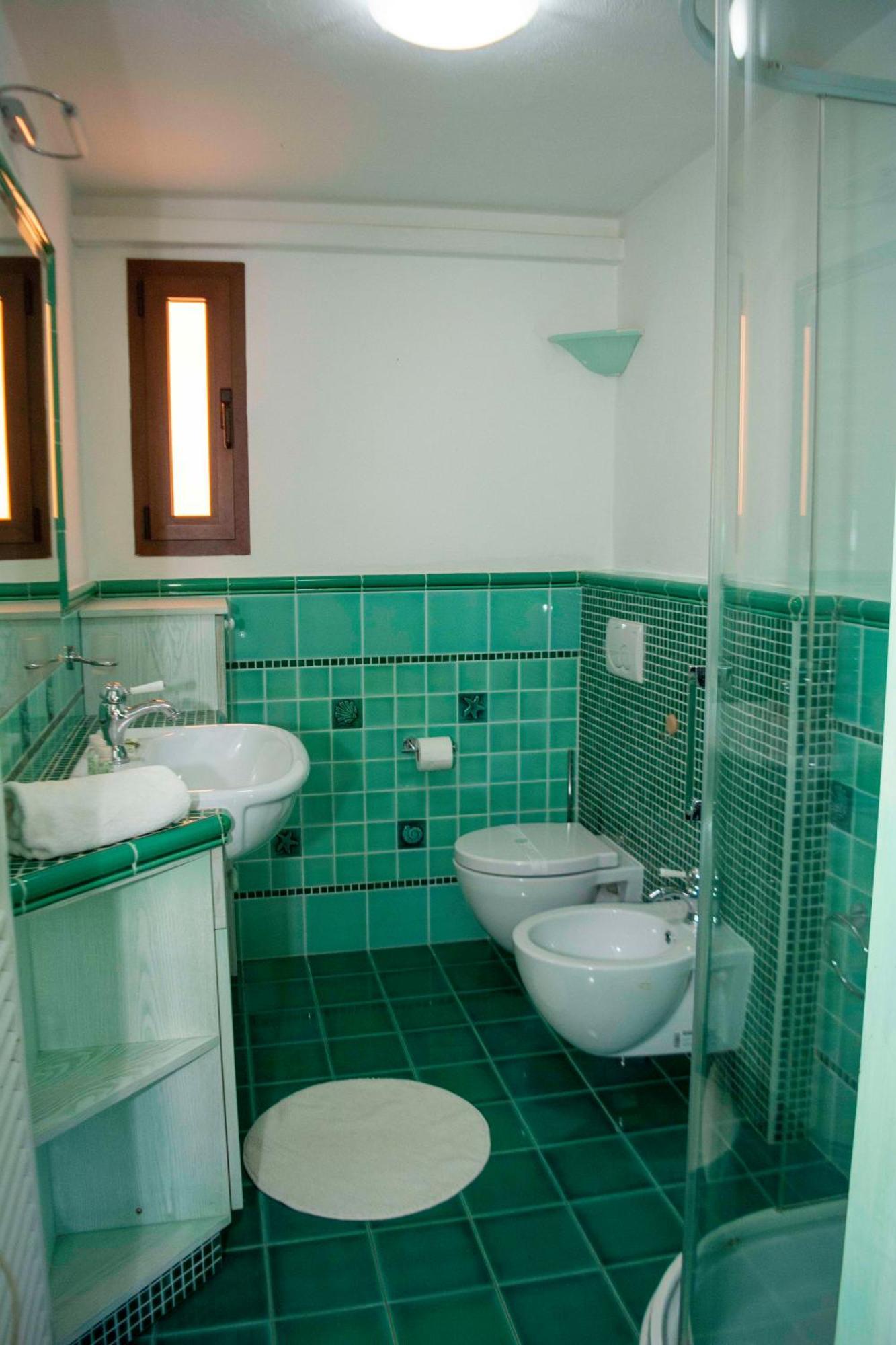Ampio Trilocale Sul Golfo Di Marinella Villa มาริเนลลา ภายนอก รูปภาพ